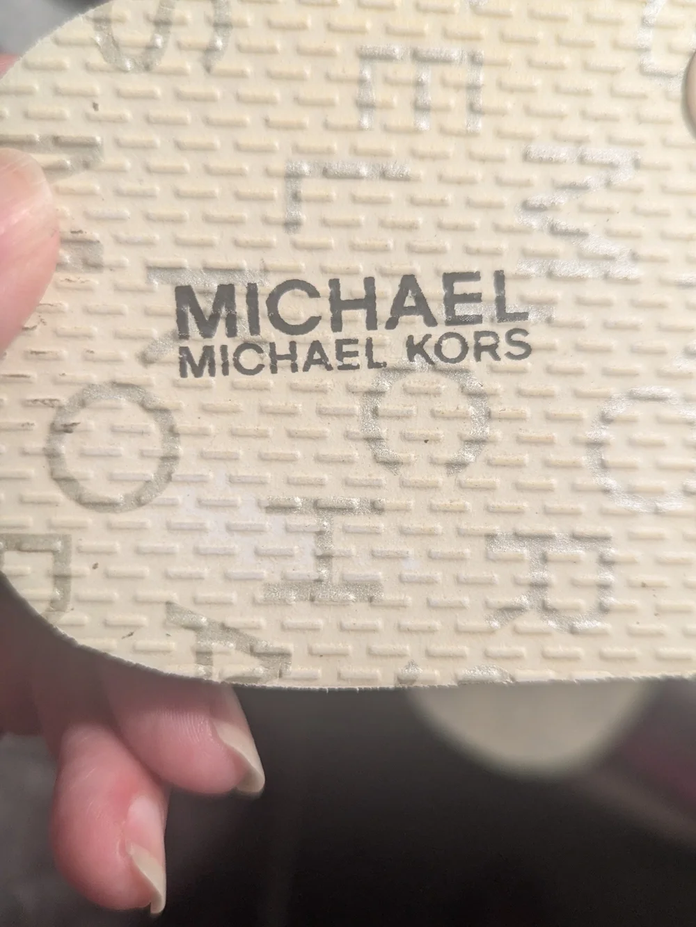 Michael Kors White Flip Flop with Silver MK Medallion